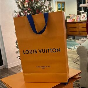 Louis Vuitton Bold Orange Bag with Blue Handles